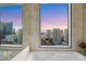 Bathroom tub with city views from the window at 222 Karen Ave # 3307, Las Vegas, NV 89109
