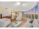 Bright living room with floor-to-ceiling windows showcasing city views, modern decor and open floor plan at 222 Karen Ave # 3307, Las Vegas, NV 89109