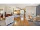 Spacious living area leading to kitchen, featuring wood floors, modern decor, and city views at 222 Karen Ave # 3307, Las Vegas, NV 89109