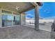 Covered patio with pool and kitchen views, showing access from inside at 10254 Fairview Ridge Ct, Las Vegas, NV 89166