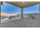 Covered patio with brick pavers, spa, and a view of the pool at 10254 Fairview Ridge Ct, Las Vegas, NV 89166