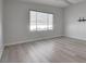 Spacious bedroom featuring hardwood floors and a ceiling fan at 10254 Fairview Ridge Ct, Las Vegas, NV 89166