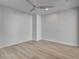 Spacious bedroom with ceiling fan and light wood flooring at 10254 Fairview Ridge Ct, Las Vegas, NV 89166