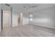 Bright bedroom with hardwood floors and ensuite bathroom access at 10254 Fairview Ridge Ct, Las Vegas, NV 89166