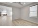 Bright bedroom with ceiling fan and view into the kitchen area at 10254 Fairview Ridge Ct, Las Vegas, NV 89166