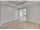 Bright bedroom with ceiling fan and view into the living area at 10254 Fairview Ridge Ct, Las Vegas, NV 89166