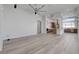 Open living space with kitchen and hardwood floors at 10254 Fairview Ridge Ct, Las Vegas, NV 89166