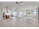 Open concept living room with kitchen and backyard access at 10254 Fairview Ridge Ct, Las Vegas, NV 89166