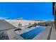 Clean lines of a rectangular pool and spa at 10254 Fairview Ridge Ct, Las Vegas, NV 89166