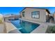 Stunning rectangular pool with a view of the house at 10254 Fairview Ridge Ct, Las Vegas, NV 89166