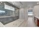 Large walk-in shower with frameless glass enclosure and stylish tile at 10254 Fairview Ridge Ct, Las Vegas, NV 89166