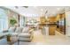 Open living space with view of the kitchen, dining area, and comfortable furnishings at 8021 Adelaide Hills St, Las Vegas, NV 89113