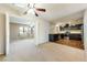 Modern kitchen with dark cabinets and stainless steel appliances at 2360 Greyhound St, Pahrump, NV 89060