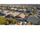 Aerial view of house and surrounding neighborhood at 3828 Alder Creek Ct, North Las Vegas, NV 89032