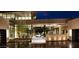 Modern entry with glass doors and desert landscaping at 7 Stoneshead Ct, Henderson, NV 89012