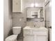 Clean bathroom with vanity, shower, and built-in storage at 3187 Silver Saddle St, Las Vegas, NV 89169