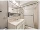 Updated bathroom with shower, vanity, and mirror at 3187 Silver Saddle St, Las Vegas, NV 89169