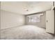 Large bedroom with grey carpet and neutral walls at 3187 Silver Saddle St, Las Vegas, NV 89169