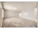 Spacious living room with grey carpet and neutral walls at 3187 Silver Saddle St, Las Vegas, NV 89169