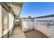 Side yard with storage shed and concrete pathway at 3187 Silver Saddle St, Las Vegas, NV 89169