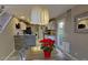 Kitchen and dining area with modern lighting and decor at 3368 Epson St, Las Vegas, NV 89129