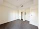 This bedroom offers ample closet space with multiple doors and neutral walls at 71 E Agate Ave # 207, Las Vegas, NV 89123