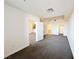 Bedroom with neutral walls, carpet flooring, with multiple entry points and an airy feel at 71 E Agate Ave # 207, Las Vegas, NV 89123