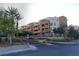 Attractive condominiums complex with well-maintained landscaping and signage at 71 E Agate Ave # 207, Las Vegas, NV 89123