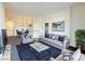 Comfortable living room featuring stylish decor, ample seating, and an open layout at 71 E Agate Ave # 207, Las Vegas, NV 89123