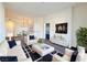 Bright living room featuring modern decor, comfortable seating, and an open floor plan at 71 E Agate Ave # 207, Las Vegas, NV 89123