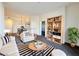 Bright living room features modern decor, comfortable seating, and an open floor plan at 71 E Agate Ave # 207, Las Vegas, NV 89123