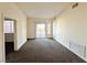 A bright room with access to a private outdoor balcony at 71 E Agate Ave # 207, Las Vegas, NV 89123
