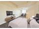 Staged main bedroom showcasing a clean, modern design with a spacious layout at 71 E Agate Ave # 207, Las Vegas, NV 89123