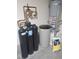 Whole-house water filtration system with water softener and other components at 8152 Satin Carnation Ln, Las Vegas, NV 89166