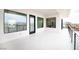 Bright, tiled balcony featuring modern windows and access doors at 3690 S Spring Mountain Blvd, Pahrump, NV 89048