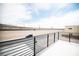 Expansive balcony with sleek railing offers scenic desert views, providing the perfect outdoor living space at 3690 S Spring Mountain Blvd, Pahrump, NV 89048
