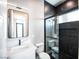 Modern bathroom featuring a sleek vanity, black marble shower, and contemporary fixtures at 3690 S Spring Mountain Blvd, Pahrump, NV 89048