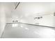 Spacious garage featuring a sealed floor, windows for natural light, and modern fixtures at 3690 S Spring Mountain Blvd, Pahrump, NV 89048