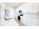 Modern kitchen with marble countertops, stainless steel appliances, and sleek cabinets offering ample storage at 3690 S Spring Mountain Blvd, Pahrump, NV 89048