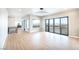 Bright living room with sleek floors, modern lighting, and large windows with mountain views at 3690 S Spring Mountain Blvd, Pahrump, NV 89048