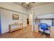 Multi-purpose bedroom featuring built-in office space and a large window for natural light at 2035 E Warm Springs Rd # 1019, Las Vegas, NV 89119