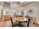 Open concept dining area adjacent to the kitchen with natural light and stylish decor at 2035 E Warm Springs Rd # 1019, Las Vegas, NV 89119