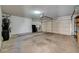 Spacious garage with ample storage, epoxy flooring, and overhead lighting at 2035 E Warm Springs Rd # 1019, Las Vegas, NV 89119