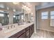 Spa-like bathroom with double vanity and large shower at 398 Espressivo St, Henderson, NV 89011