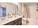 Bathroom with double vanity and shower/tub combo at 398 Espressivo St, Henderson, NV 89011