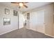 Bedroom with ceiling fan and access to another room at 398 Espressivo St, Henderson, NV 89011