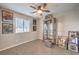 Bright bedroom with ceiling fan and window coverings at 398 Espressivo St, Henderson, NV 89011