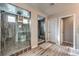 Large walk-in shower with glass enclosure and modern fixtures at 398 Espressivo St, Henderson, NV 89011