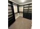 Well-organized walk-in closet with shelves and hanging rods at 398 Espressivo St, Henderson, NV 89011