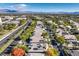Aerial view of community with houses, roads, and mountain views in background at 525 Summer Mesa Dr, Las Vegas, NV 89144